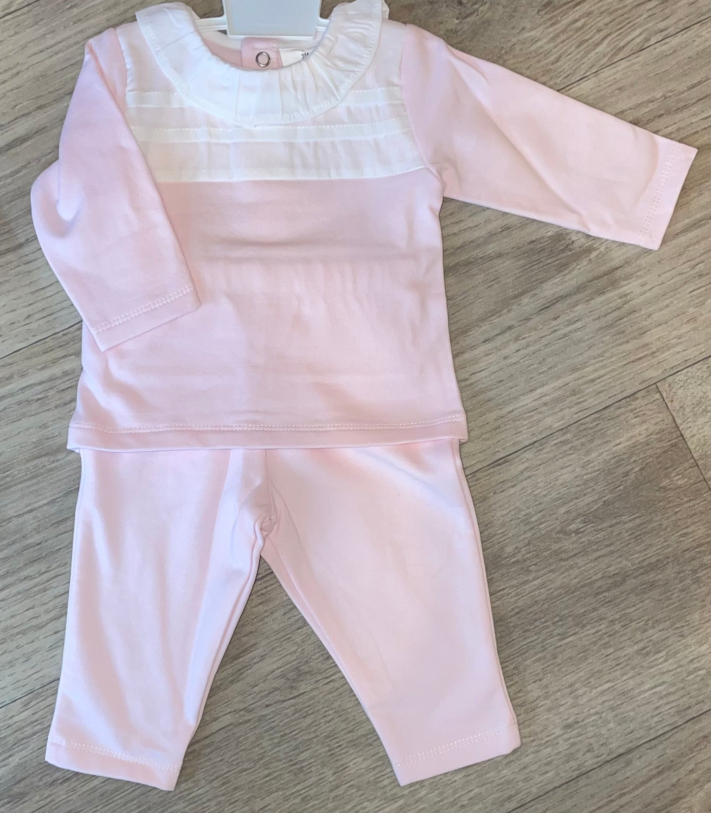 Pink tracksuit Ruffled collar